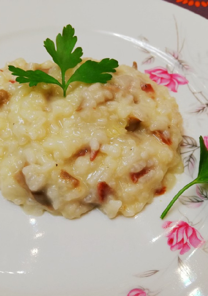 Una foto de Risotto de jamón y setas con robot mambo
