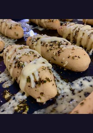 Una foto de Palitos de ajo y queso