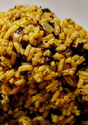 Una foto de ARROZ,🍛Coca-Cola y Uvas Pasas...!😛