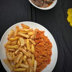 Crinkle fried sweet potatoes and egg sauce A picture of Crinkle fried sweet potatoes and egg sauce.