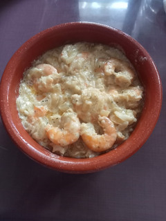 Una foto de Langostinos con crema de curry
