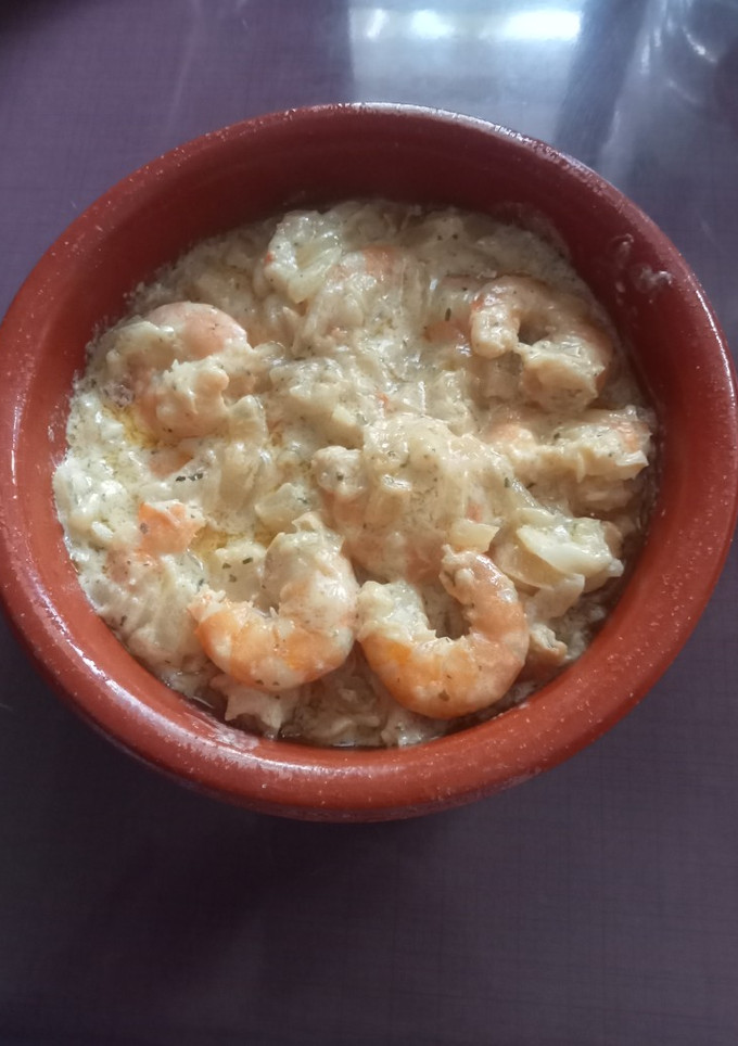 Una foto de Langostinos con crema de curry