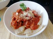 Una foto de raviolis de carne