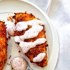 A picture of Parmesan-oregano crusted chicken with sumac dressing.
