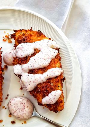 A picture of Parmesan-oregano crusted chicken with sumac dressing.
