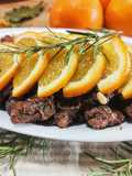 Bocconcini di cinghiale con arancia pinoli e prugne