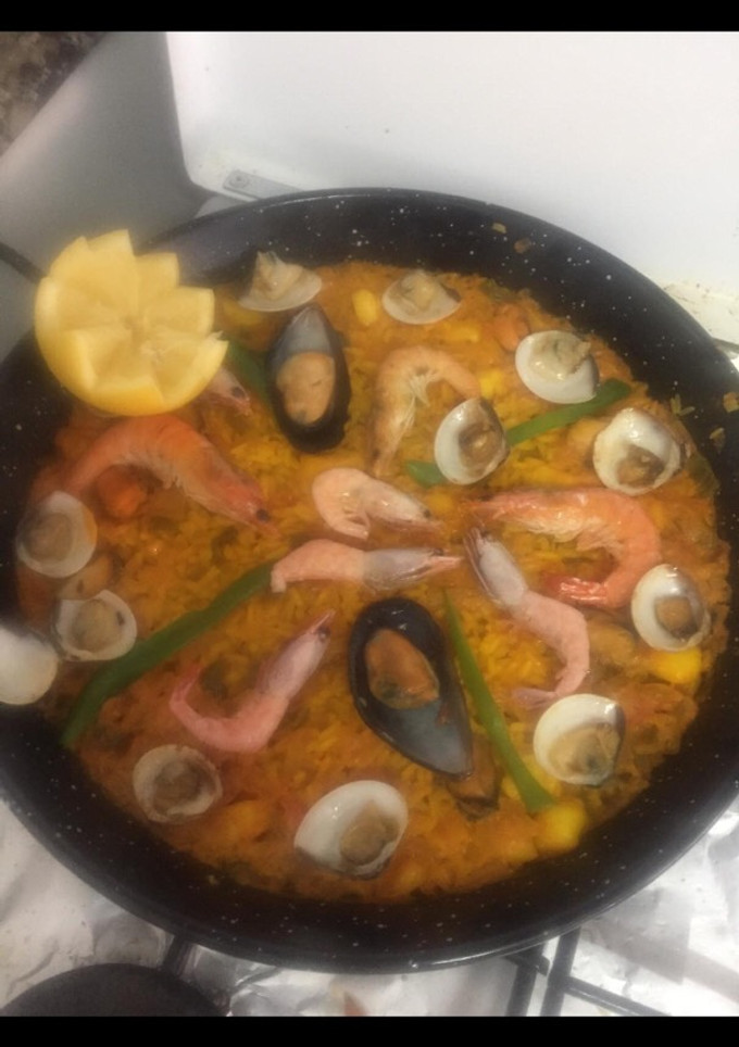 Una foto de Paella de marisco