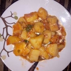 A picture of Matoke (cooked bananas and potatoes).