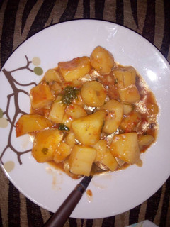 A picture of Matoke (cooked bananas and potatoes).