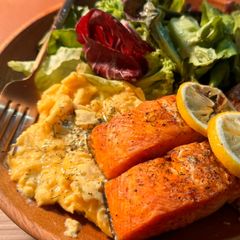 A picture of Air fried crispy salmon with scrambled eggsʕ·͡ᴥ·ʔ.