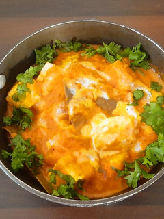A picture of Paneer in red gravy.