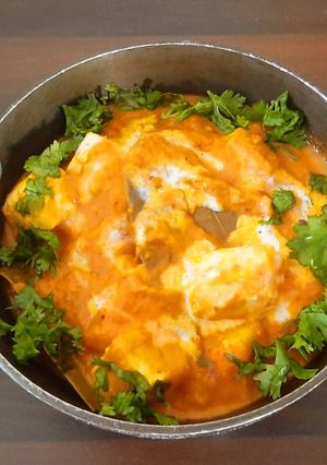 A picture of Paneer in red gravy.