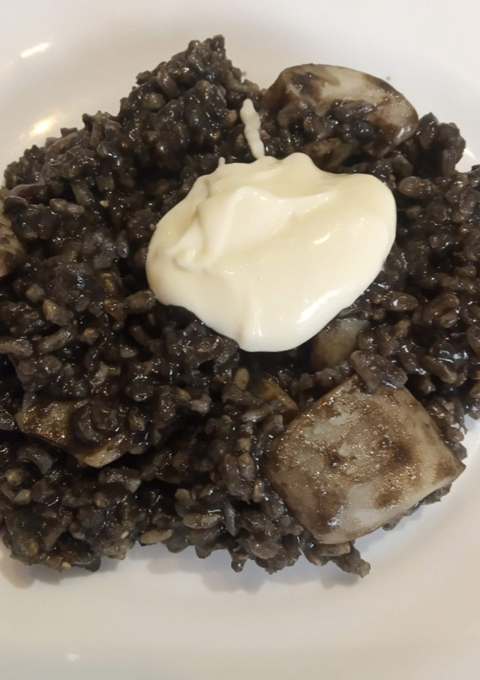 Una foto de Arroz negro con Sepia