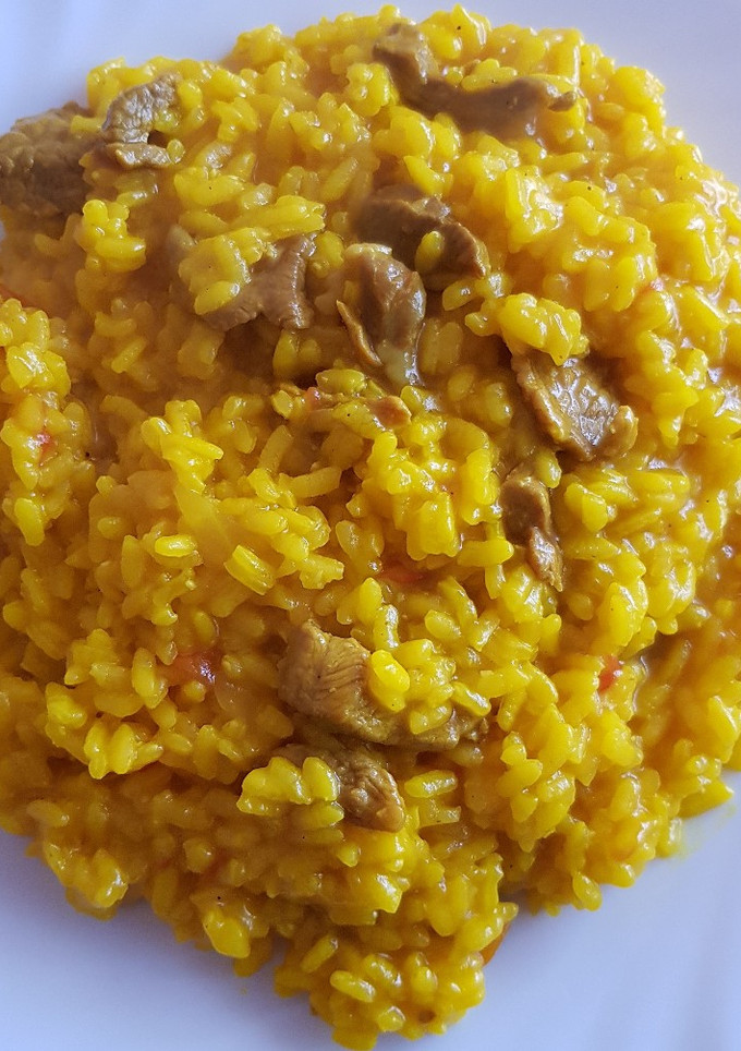 Una foto de Arroz con carne