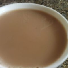 A picture of Cinnamon and cardamon tea.