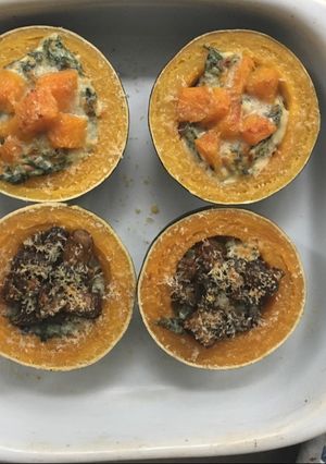 A picture of Creamed Spinach and mushroom stuffed Gem Squash with butternut.
