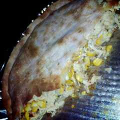 A picture of Tarta de pollo y choclo.