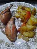 Pata y muslo con papas al horno