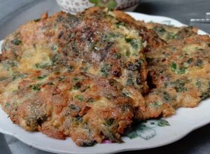 Hình của món Trứng chiên với thịt heo và lá lốt.