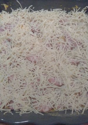 Une photo de Gratin de butternut-pommes de terre-saucisse de morteaux