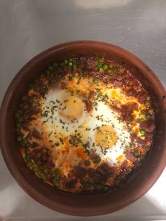 Una foto de Huevos a la flamenca