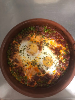 Una foto de Huevos a la flamenca