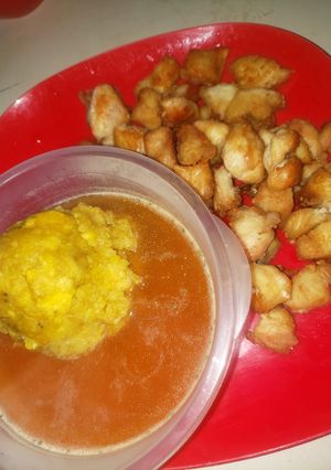 A picture of Mofongo Balls with Fried Meat and Chicken Broth.