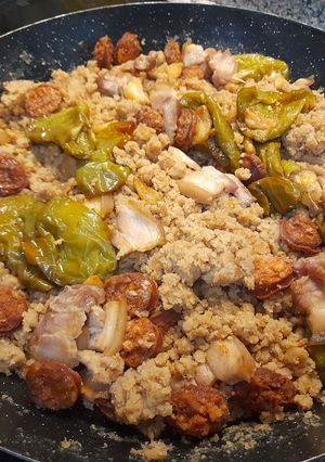 A picture of Migas with Crispy Pork Belly.