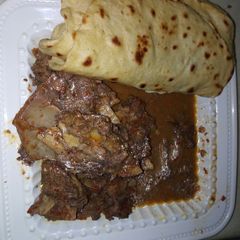 A picture of Pappe soup with Arabian bread.