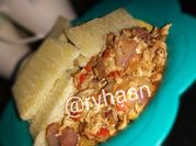 A picture of yam with vegetable sauce