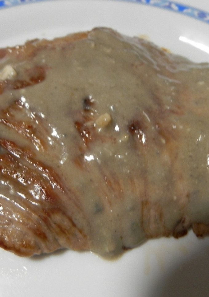 Una foto de Presa ibérica a la plancha con salsa de cabrales
