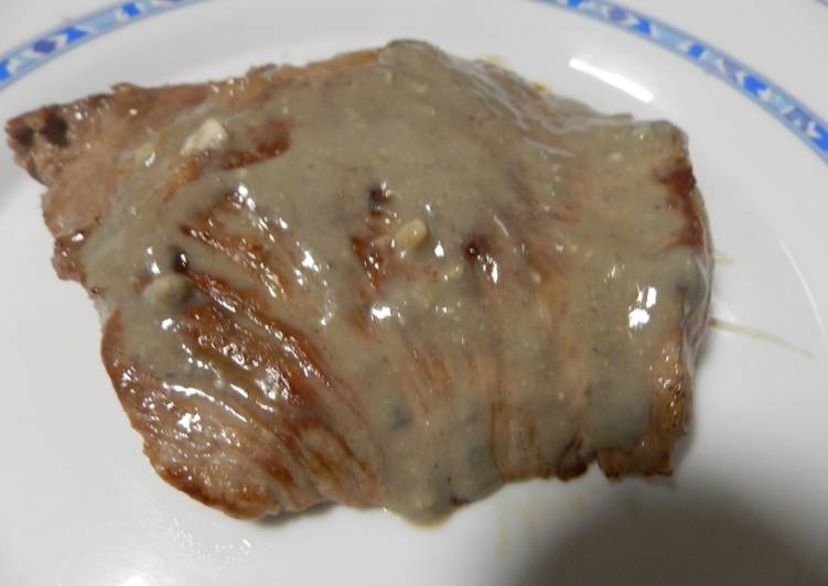 Presa ibérica a la plancha con salsa de cabrales