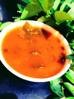 A picture of Tomato rasam.