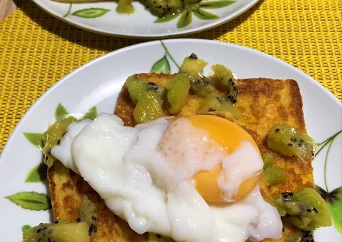Breakfast toast with poached egg and kiwi