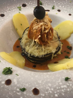 Una foto de Milhojas filete y berenjena