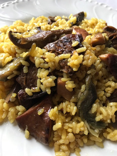 Una foto de Arroz con rovellons / níscalos