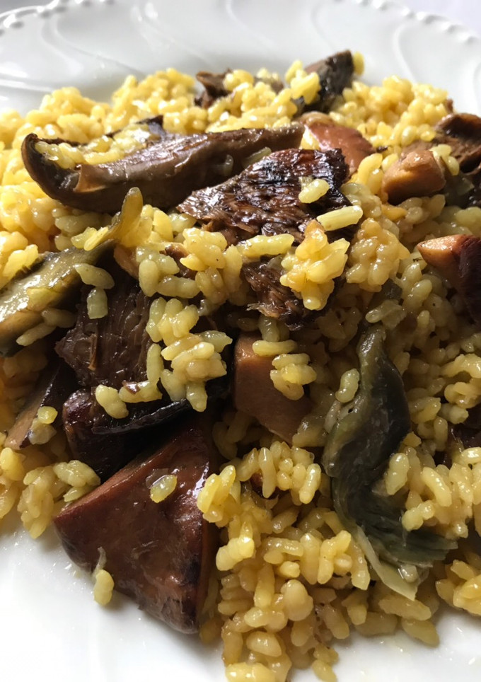 Una foto de Arroz con rovellons / níscalos