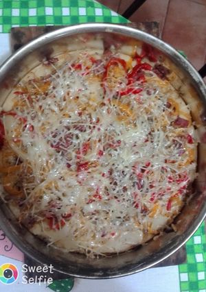 Una foto de Parecido a la pizza, sin levadura. Con royal y sin salsa