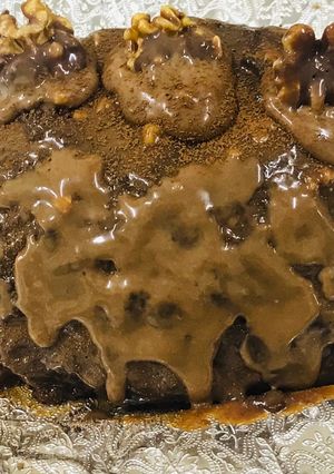 A picture of Decadent chocolate shell cake.
