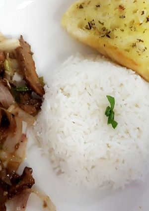 A picture of Stir fry beef and rice.