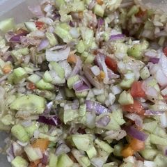 A picture of Kachombar salad with soya sauce dressing.