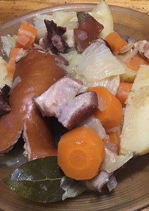 A picture of Chinese Cabbage Stew with Potatoes, Carrots, Onions, Sausage, and Bacon.