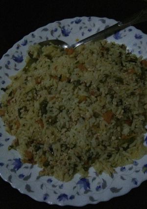 A picture of Simple rice(pilau) with eggs.