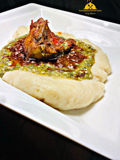 A picture of Semovita (swallow)with okra soup and stew.