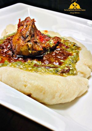 A picture of Semovita (swallow)with okra soup and stew.