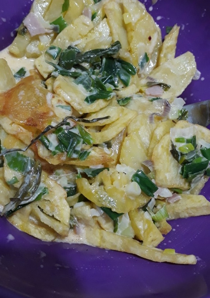Una foto de Papas con crema y verdeo