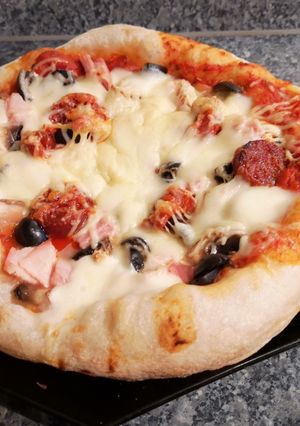 Une photo de Pâte à pizza ou à pain