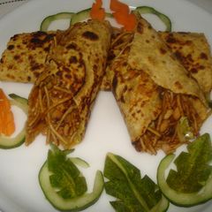 A picture of Noodles stuffed Dosa paratha.