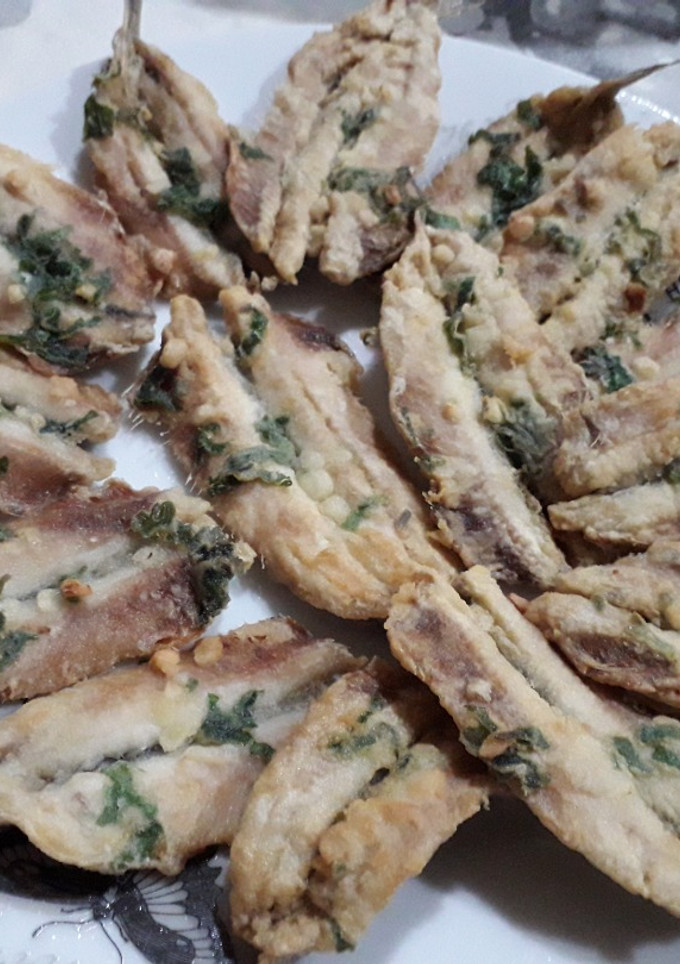 Una foto de Boquerones fritos al ajoperejil