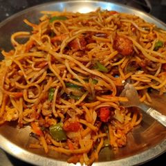 A picture of Egg chicken noodles.